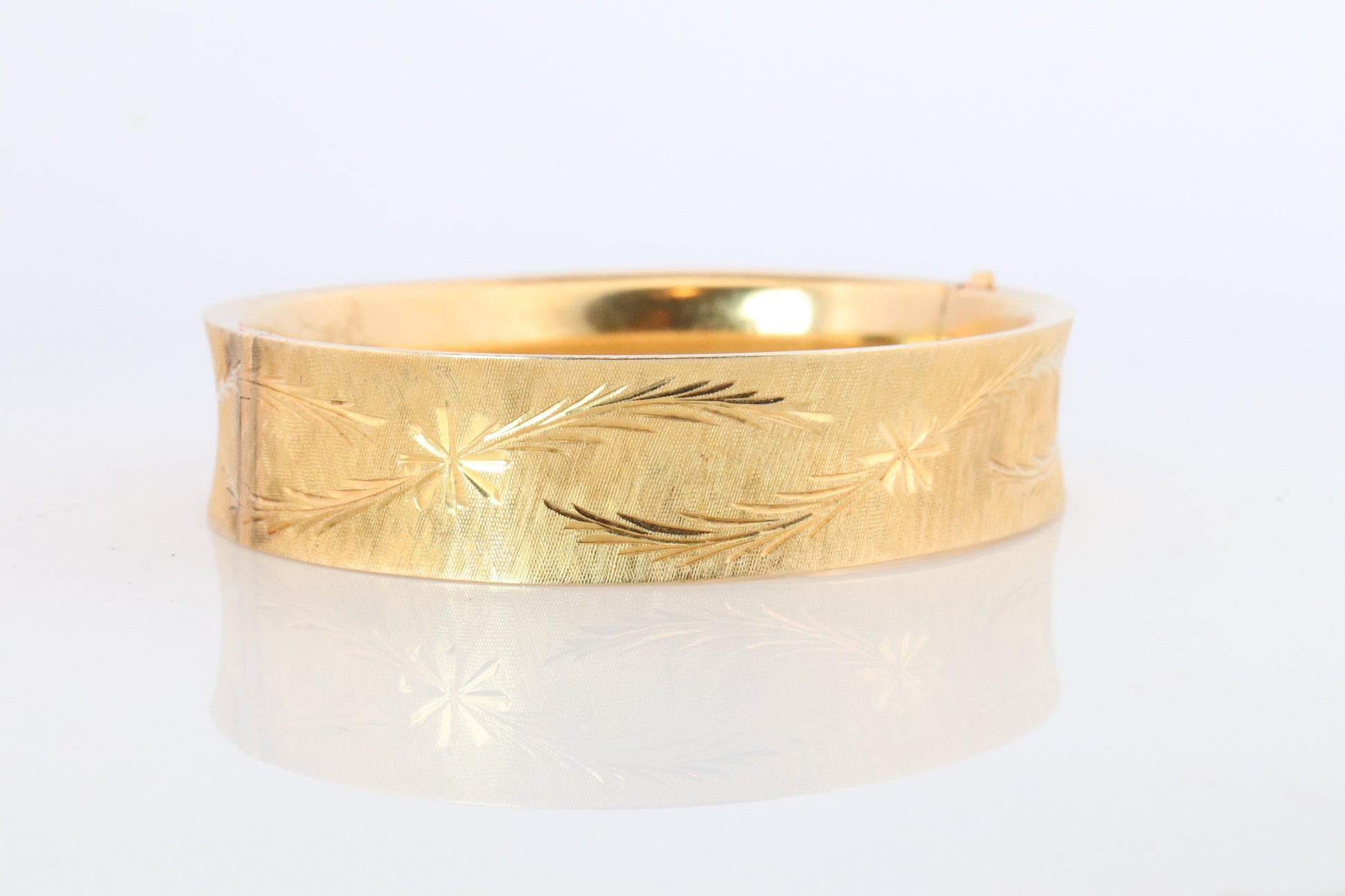 14k Bangle Bracelet. Hinged Hollow Bangle Bracelet Engraved with Leaves