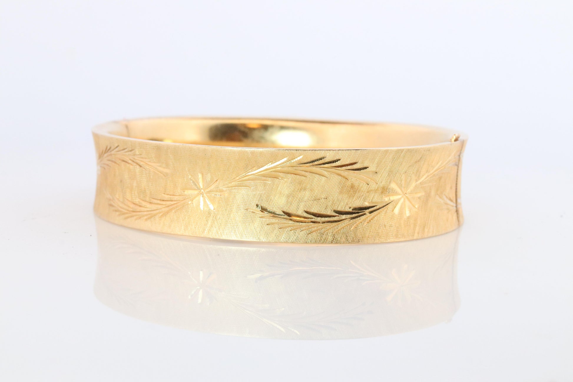 14k Bangle Bracelet. Hinged Hollow Bangle Bracelet Engraved with Leaves