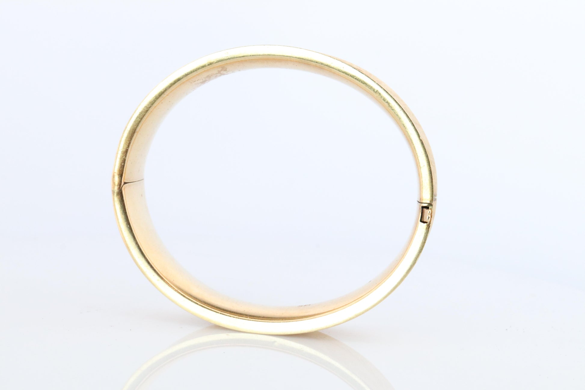 14k Bangle Bracelet. Hinged Hollow Bangle Bracelet Engraved with Leaves