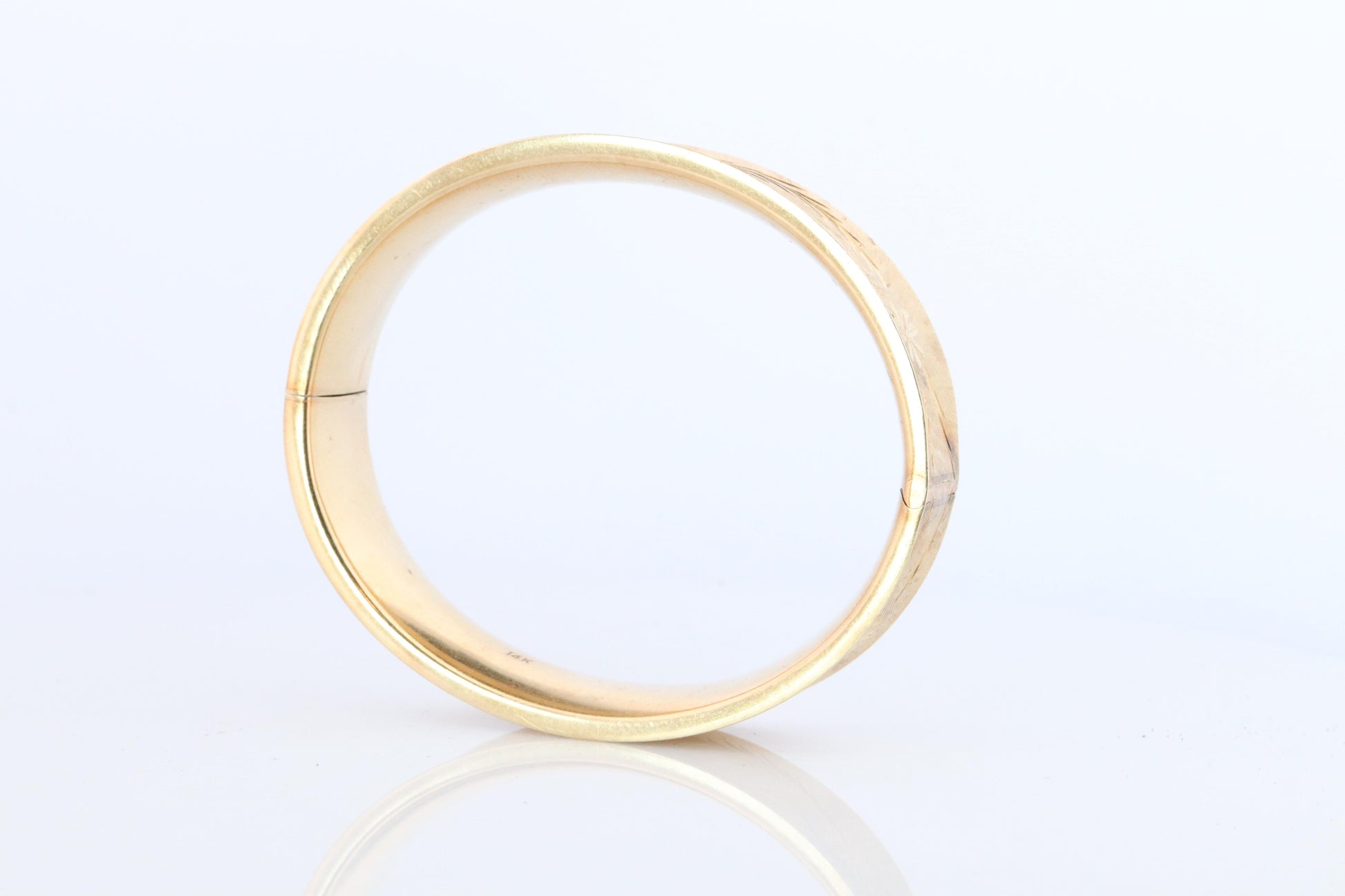14k Bangle Bracelet. Hinged Hollow Bangle Bracelet Engraved with Leaves