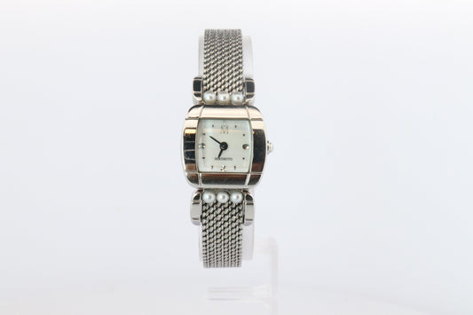 Mikimoto 500059 Watch. Mikimoto Pearl and MOP Dial ladies watch