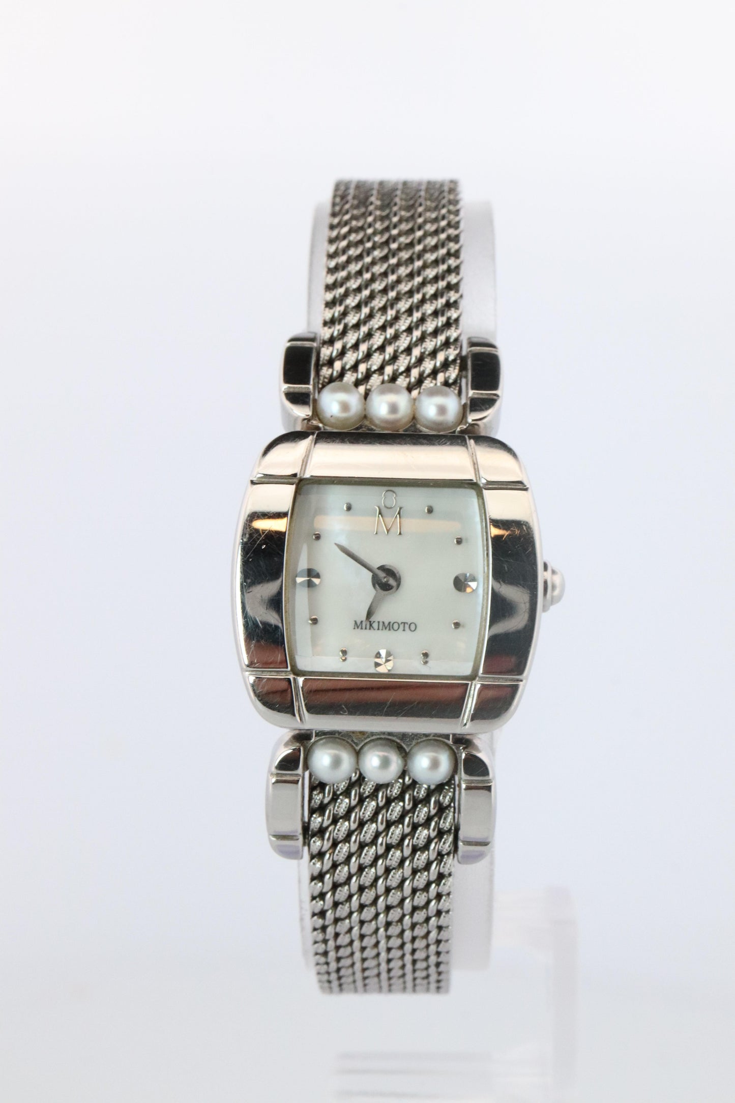 Mikimoto 500059 Watch. Mikimoto Pearl and MOP Dial ladies watch