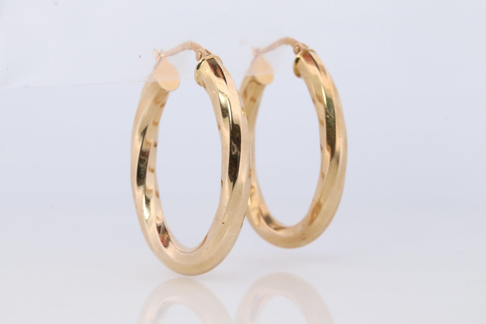 14k Gold Puffed Hollow HOOP Earrings. Large Oval HOOP earrings Twisted design.