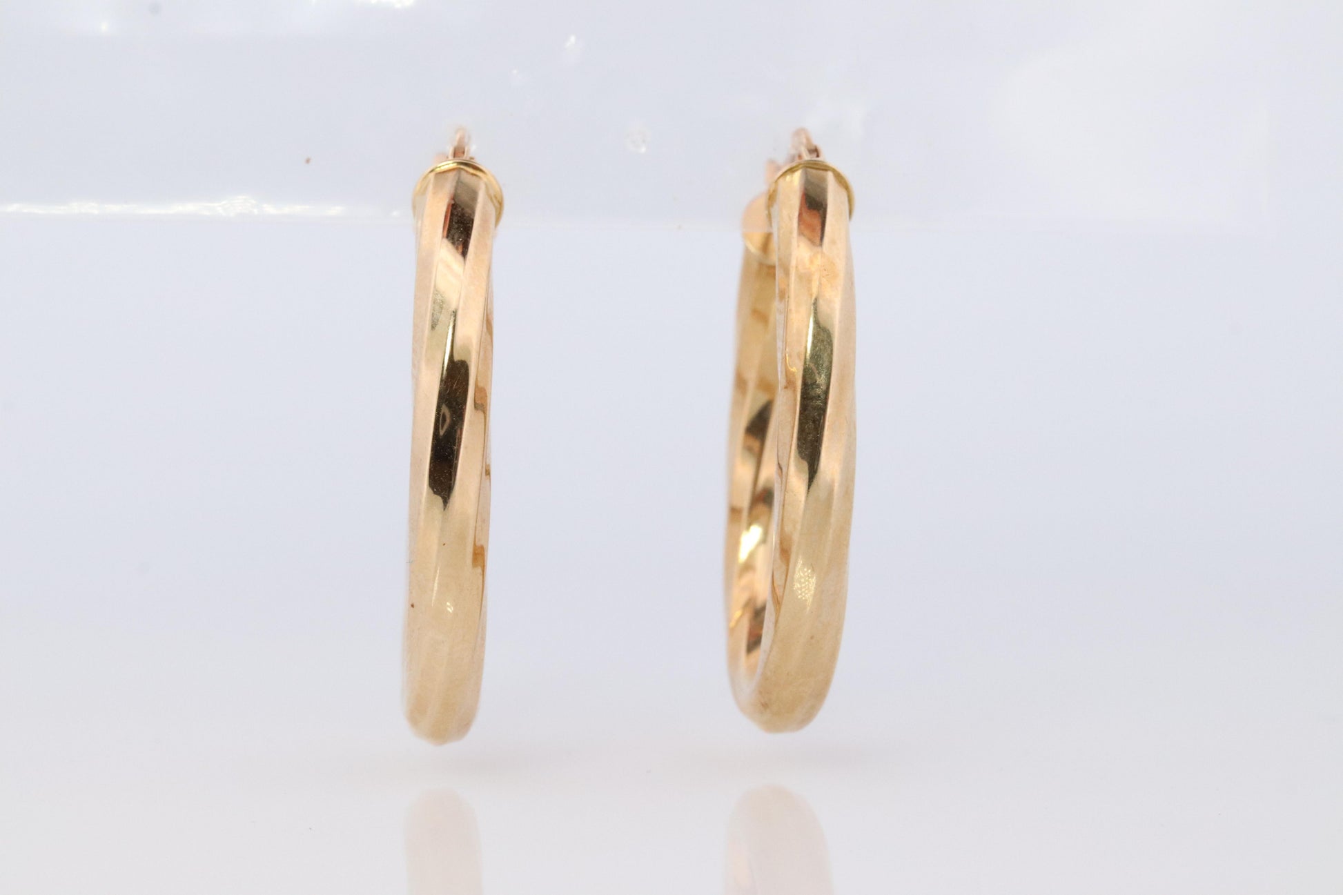 14k Gold Puffed Hollow HOOP Earrings. Large Oval HOOP earrings Twisted design.