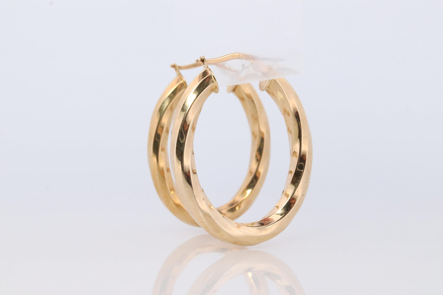 14k Gold Puffed Hollow HOOP Earrings. Large Oval HOOP earrings Twisted design.