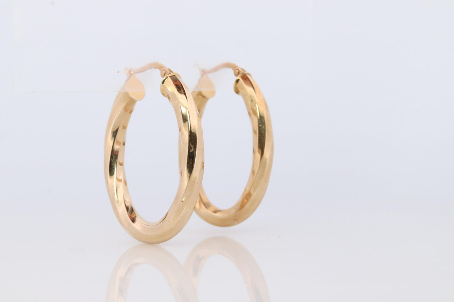 14k Gold Puffed Hollow HOOP Earrings. Large Oval HOOP earrings Twisted design.