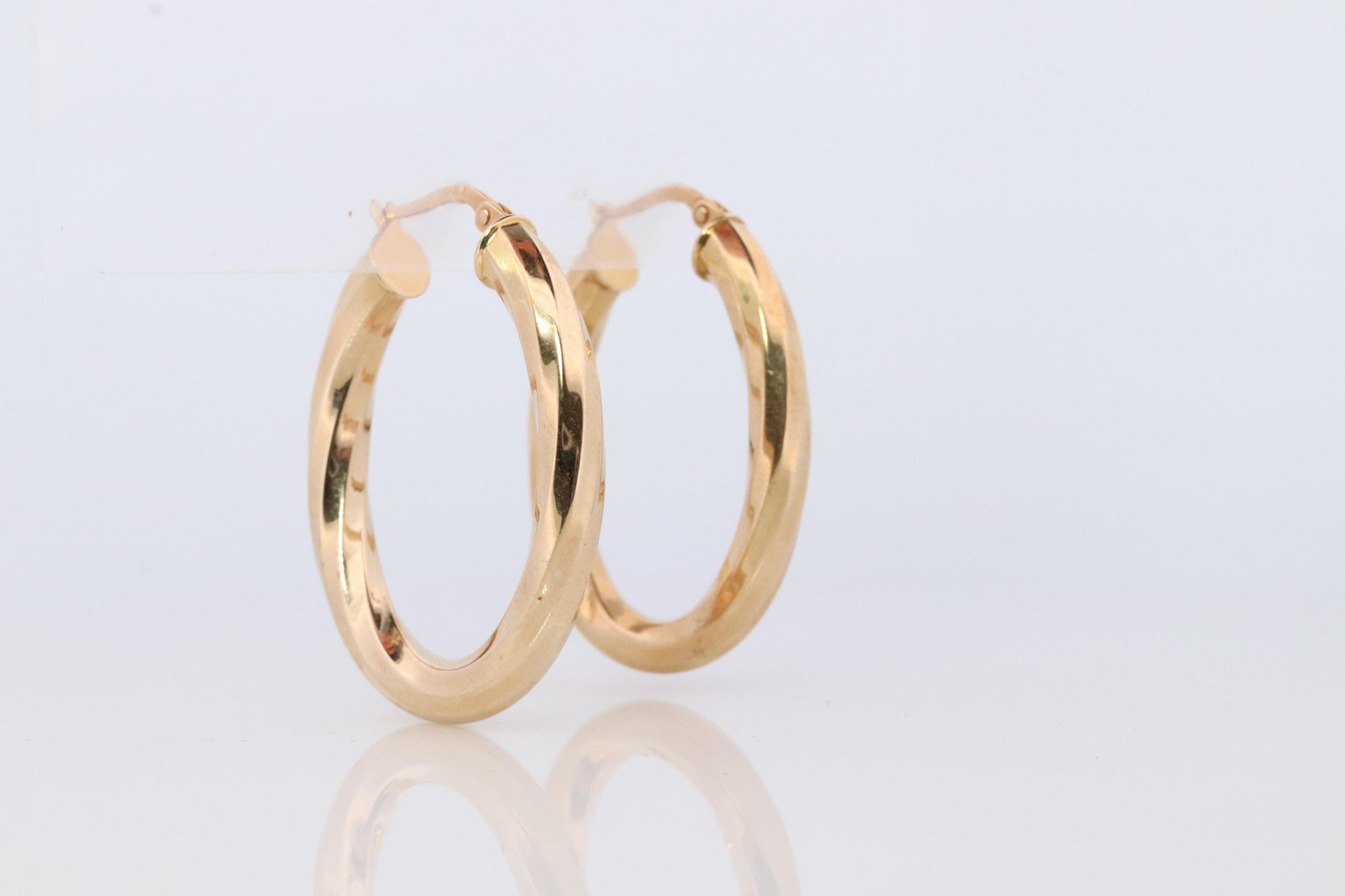 14k Gold Puffed Hollow HOOP Earrings. Large Oval HOOP earrings Twisted design.