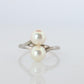 Mikimoto Pearl Ring. Sterling Silver Mikimoto Sapphire Twin Pearl Bypass band.