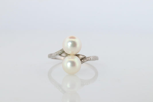 Mikimoto Pearl Ring. Sterling Silver Mikimoto Sapphire Twin Pearl Bypass band.