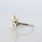 Mikimoto Pearl Ring. Sterling Silver Mikimoto Sapphire Twin Pearl Bypass band.