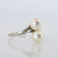 Mikimoto Pearl Ring. Sterling Silver Mikimoto Sapphire Twin Pearl Bypass band.