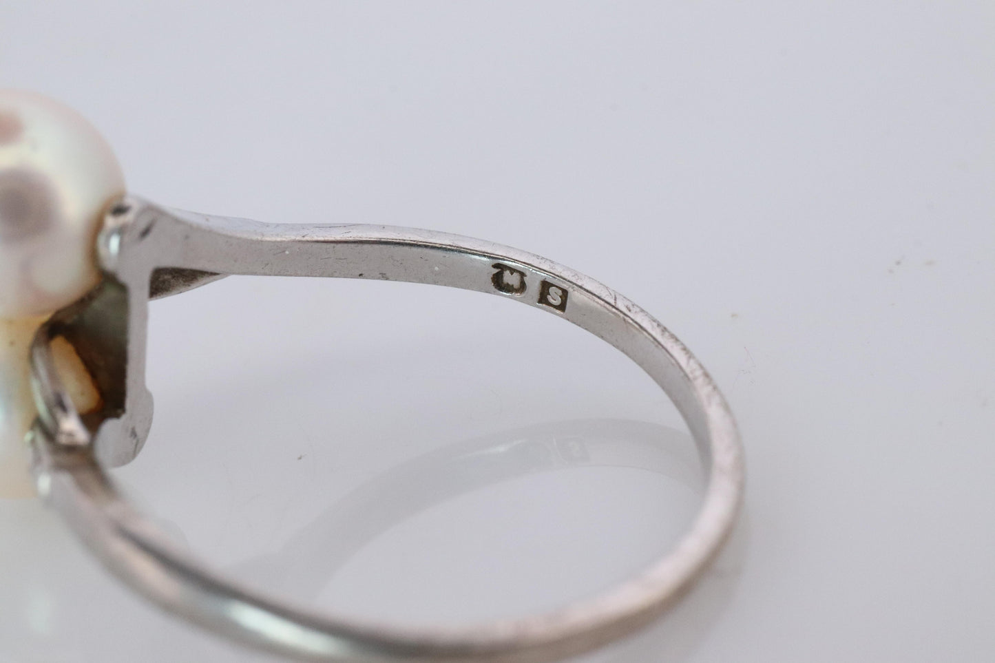 Mikimoto Pearl Ring. Sterling Silver Mikimoto Sapphire Twin Pearl Bypass band.