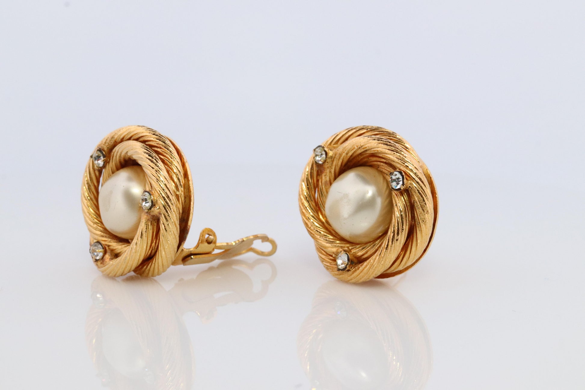 Chanel Earrings. Genuine CHANEL Mabe Pearl Crystal Coil Knot Clip on earrings.