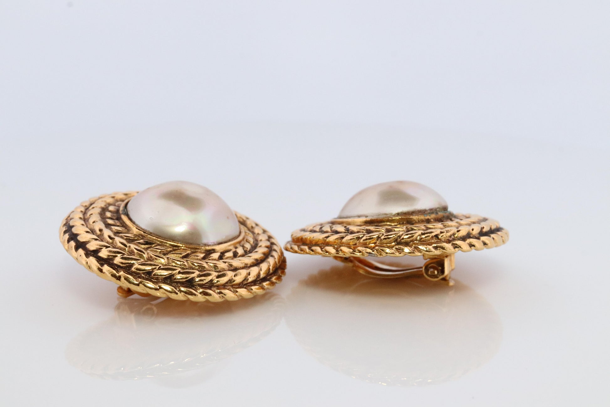 Chanel Earrings. Genuine  CHANEL Mabe Pearl Coil Weave Clip on earrings.