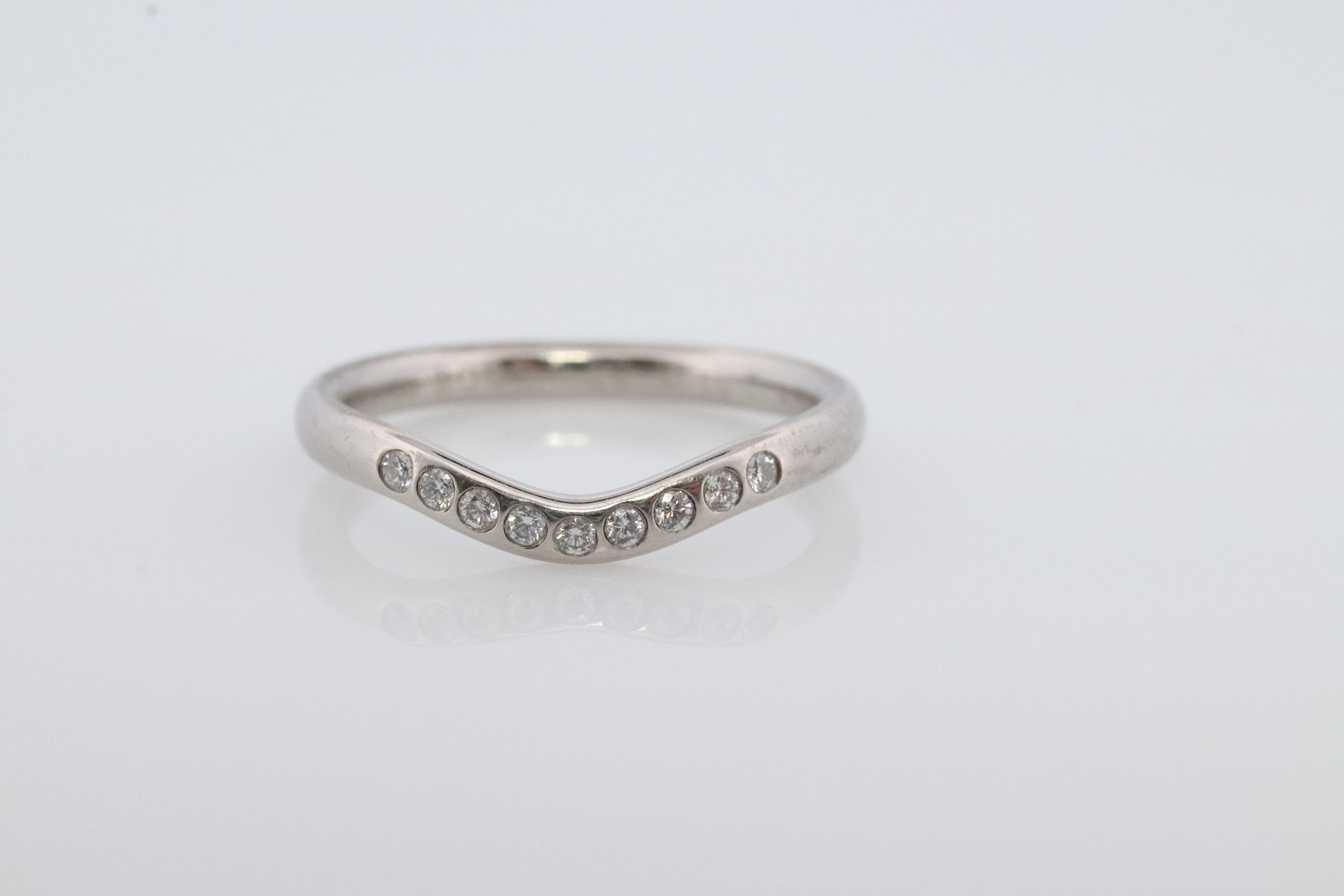 Vintage Tiffany and Co. Diamond Eternity Platinum Ring. Tiffany Curve PT950 band