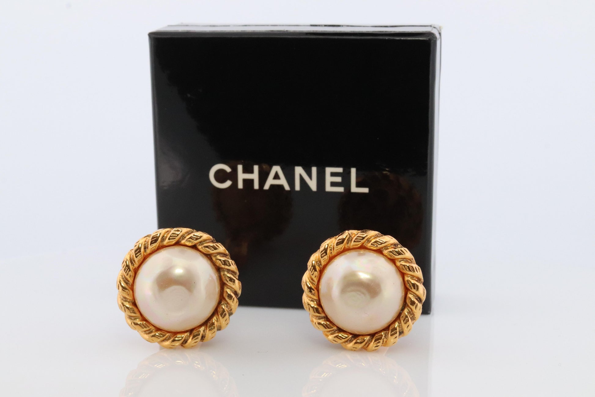 Chanel Earrings. Genuine  CHANEL Mabe Pearl Coil Weave Clip on earrings.