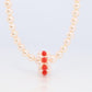 Tasaki Necklace. 18k Tasaki Pearl and Coral Bead Strand Necklace.