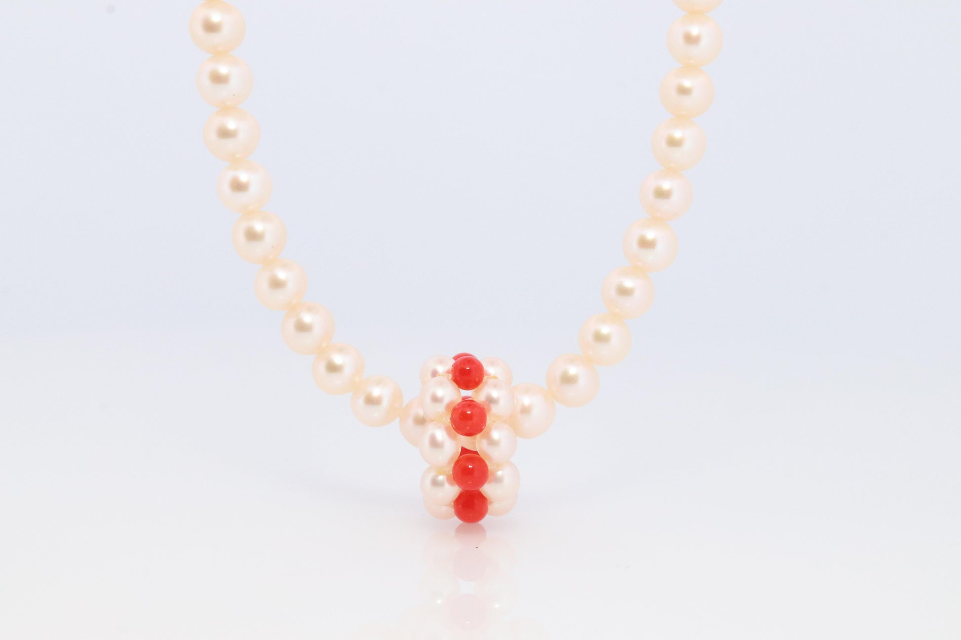 Tasaki Necklace. 18k Tasaki Pearl and Coral Bead Strand Necklace.