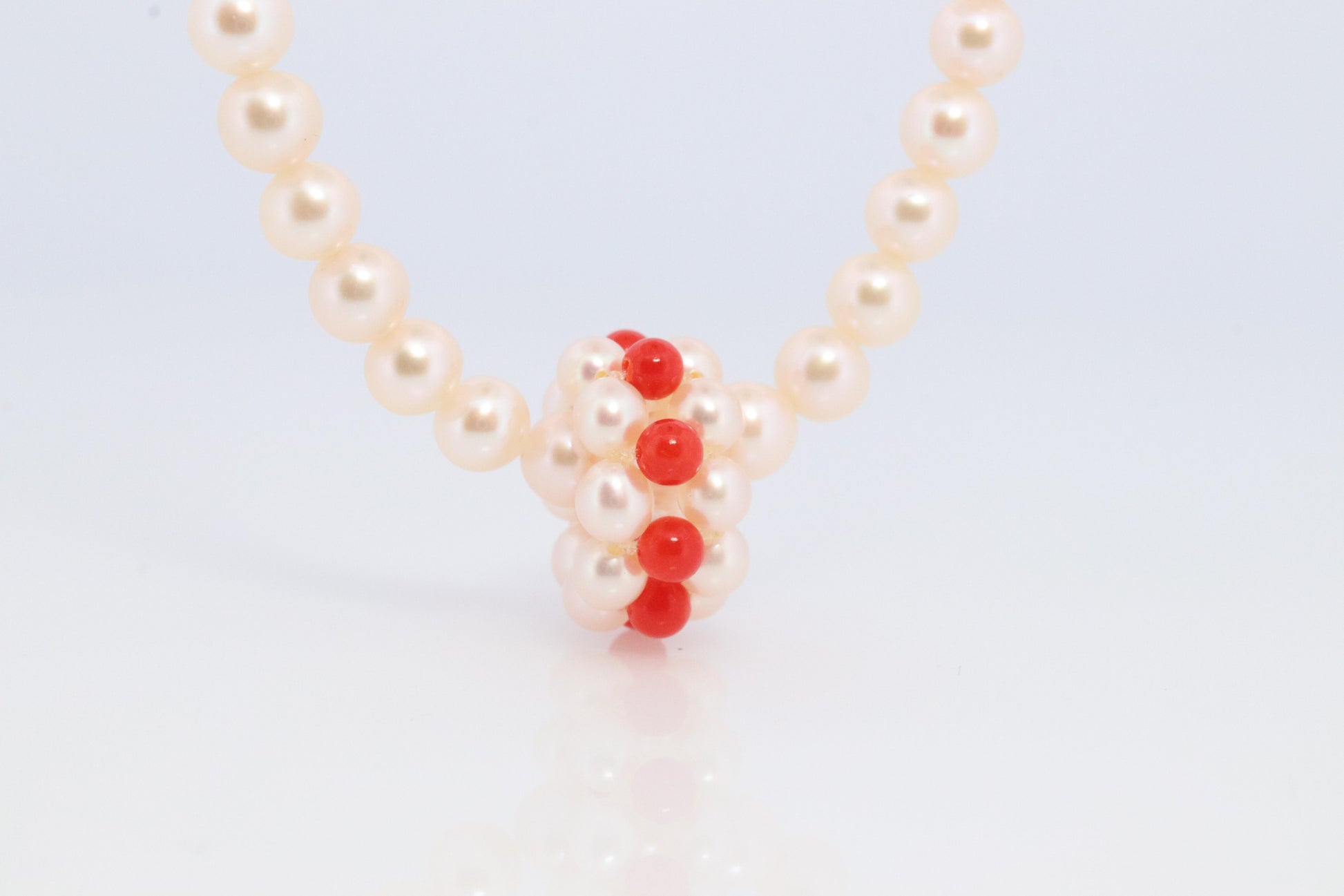 Tasaki Necklace. 18k Tasaki Pearl and Coral Bead Strand Necklace.