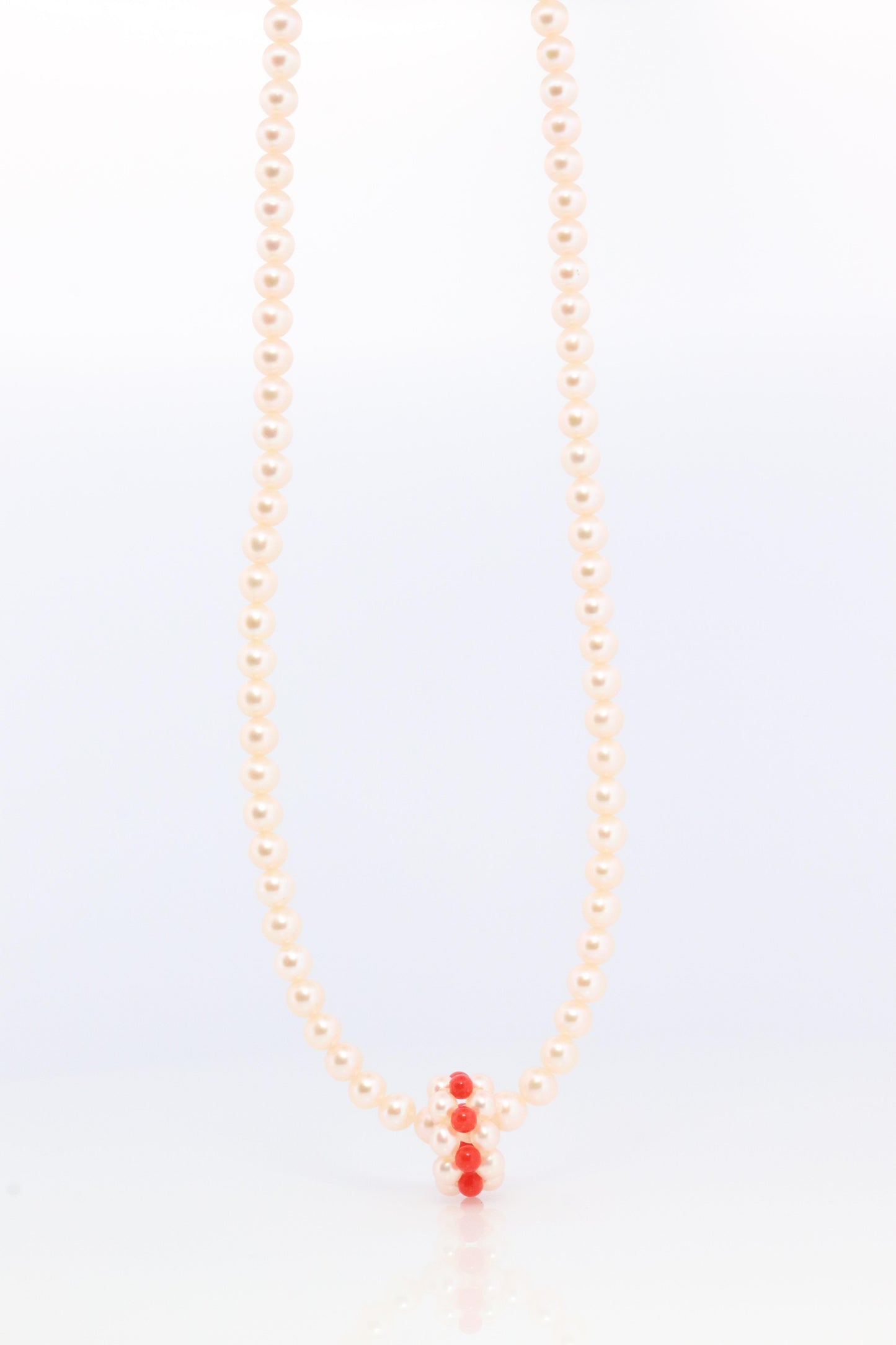 Tasaki Necklace. 18k Tasaki Pearl and Coral Bead Strand Necklace.