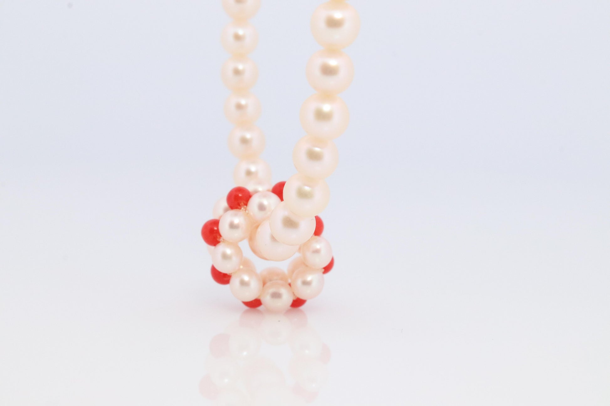 Tasaki Necklace. 18k Tasaki Pearl and Coral Bead Strand Necklace.