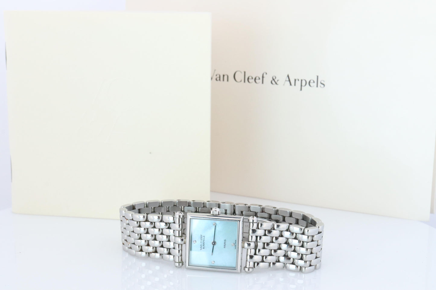 Van Cleef and Arpels 522642 watch. Classique Square Blue Shell Dial