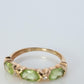 10k Green Peridot and diamond band. 10k yellow gold 3 stone peridot ring.