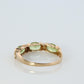 10k Green Peridot and diamond band. 10k yellow gold 3 stone peridot ring.