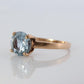 10k Aquamarine Topaz Solitaire Ring. 10k yellow gold band ring.