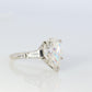 14k Gold LARGE White Topaz Pear cut engagement ring. Baguette and Pear Solitaire