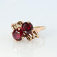 10k Victorian Claw Set Ruby Ring. Twin gem bypass bow ring.