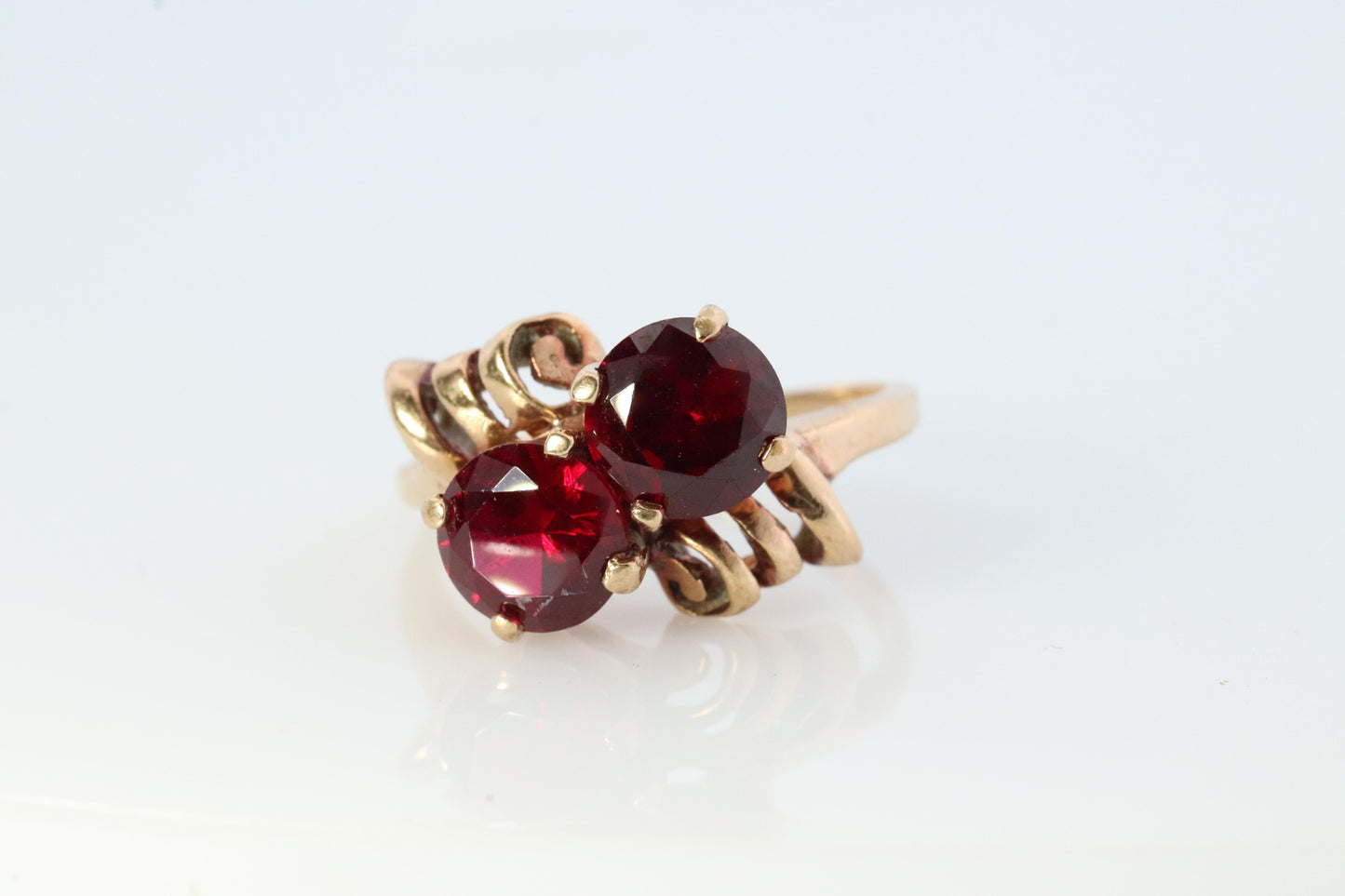 10k Victorian Claw Set Ruby Ring. Twin gem bypass bow ring.