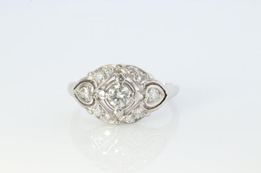 14k Art Deco Shield ring 14k white gold with diamonds and filigree open design.