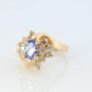 Tanzanite and diamond Cluster ring. 14k Blue Tanzanite and Diamond Halo Bypass