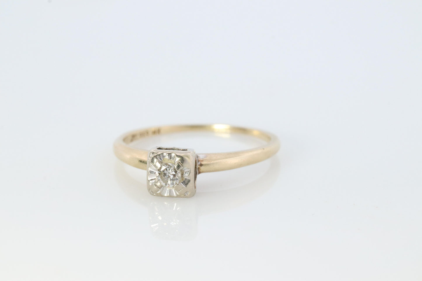 Art Deco Diamond ring. 14k Yellow and White Gold Square table.