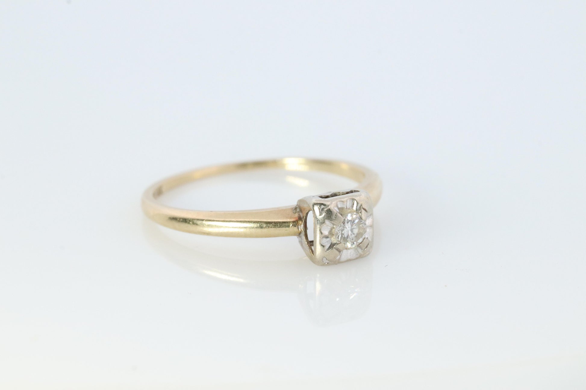 Art Deco Diamond ring. 14k Yellow and White Gold Square table.