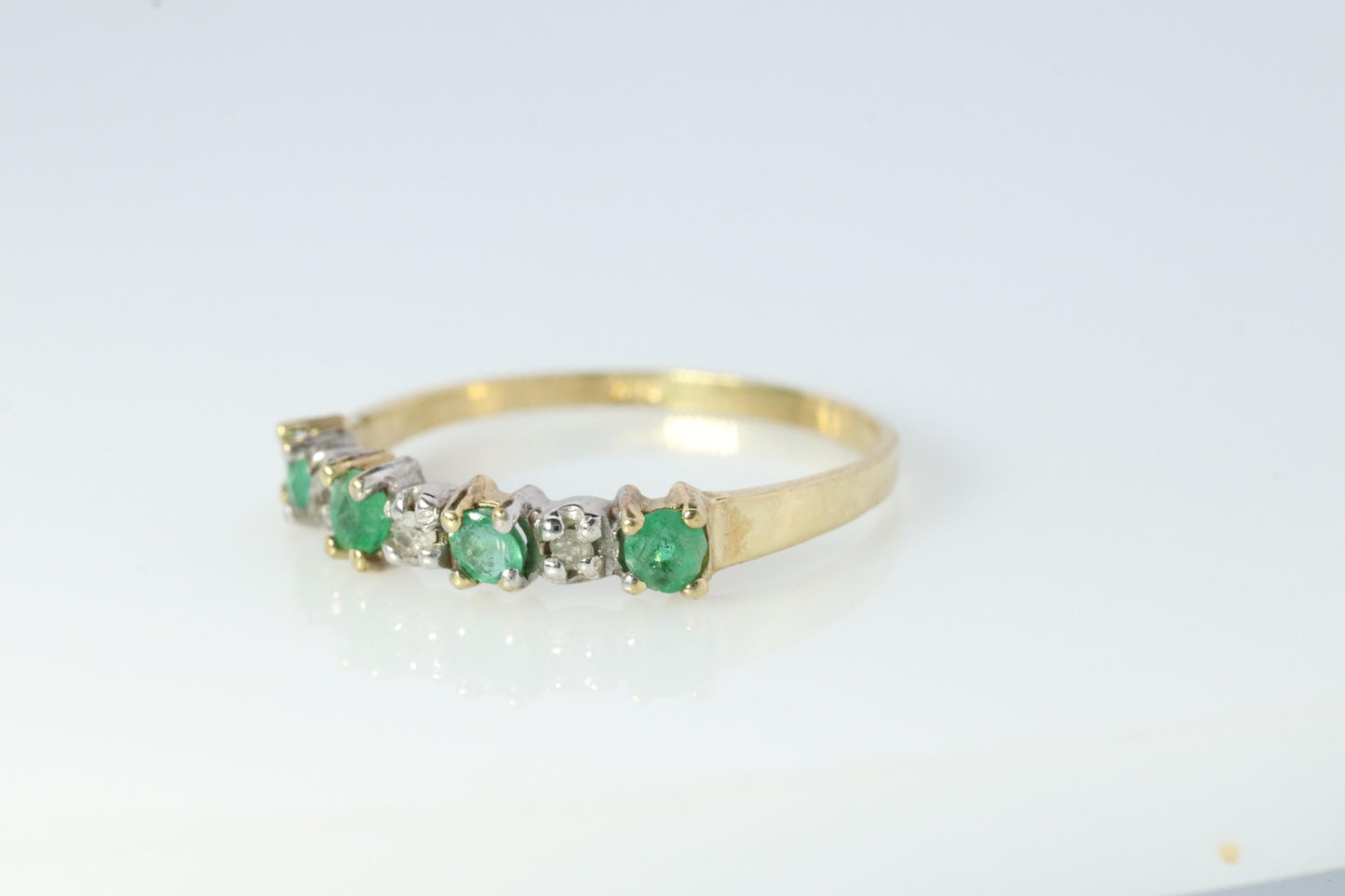 10k Eternity Natural Emerald Yellow gold ring. Half Alternating Eternity band.