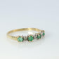 10k Eternity Natural Emerald Yellow gold ring. Half Alternating Eternity band.