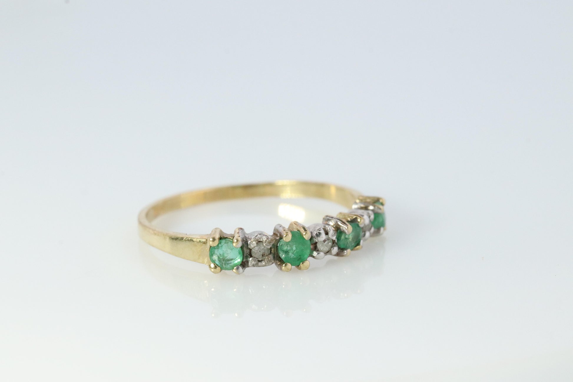 10k Eternity Natural Emerald Yellow gold ring. Half Alternating Eternity band.