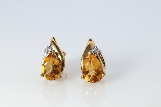 10k Pear Citrine Earrings. Pearl and diamond Bypass stud earrings.