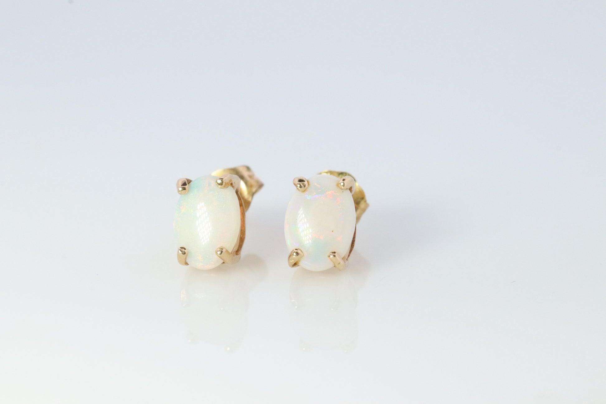 10k Opal Solitaire Stud Earrings. Very Adorable and Cute Earrings.