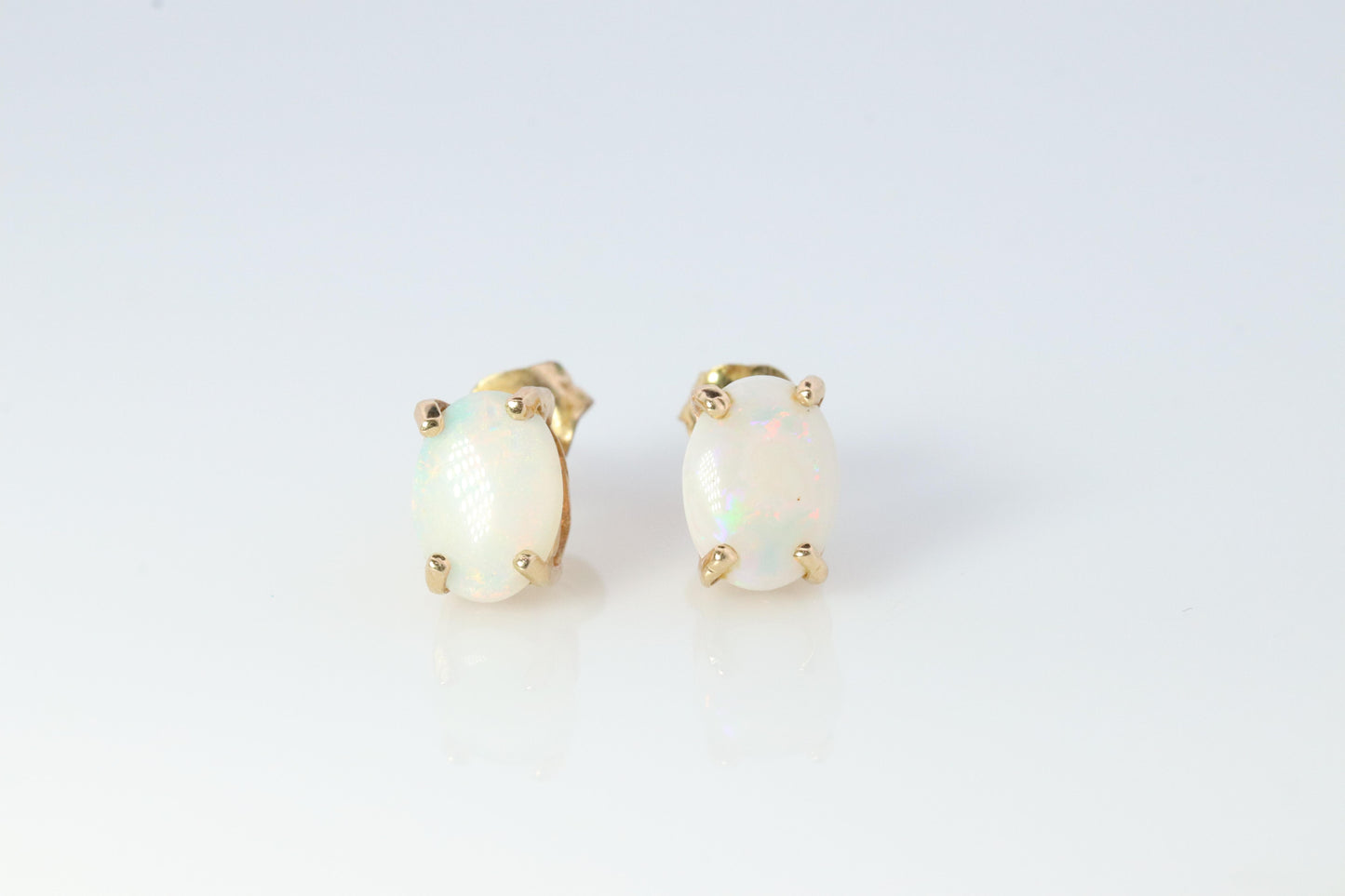 10k Opal Solitaire Stud Earrings. Very Adorable and Cute Earrings.