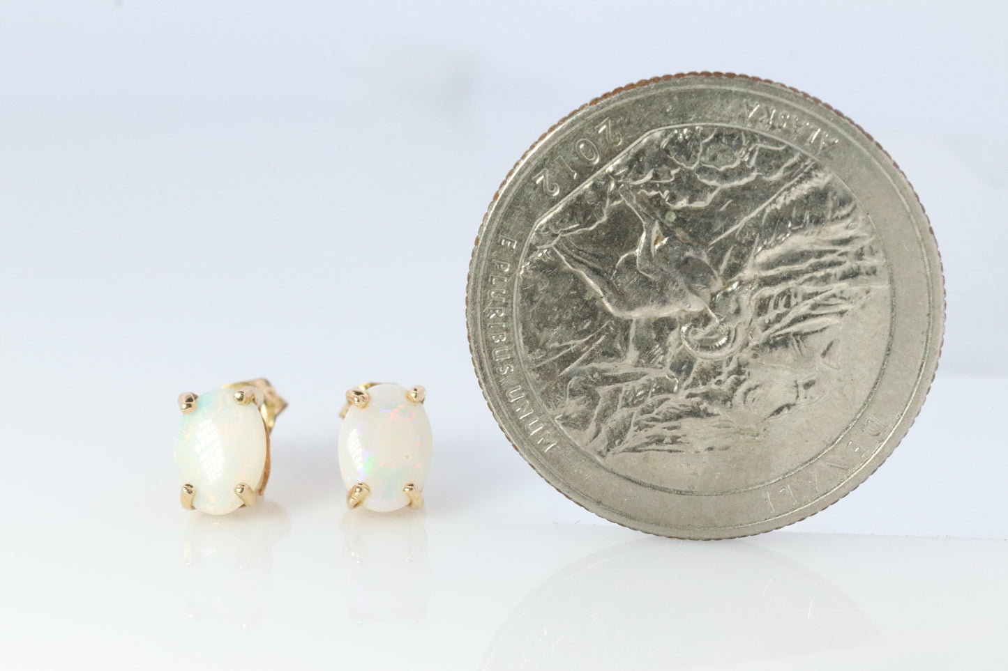 10k Opal Solitaire Stud Earrings. Very Adorable and Cute Earrings.