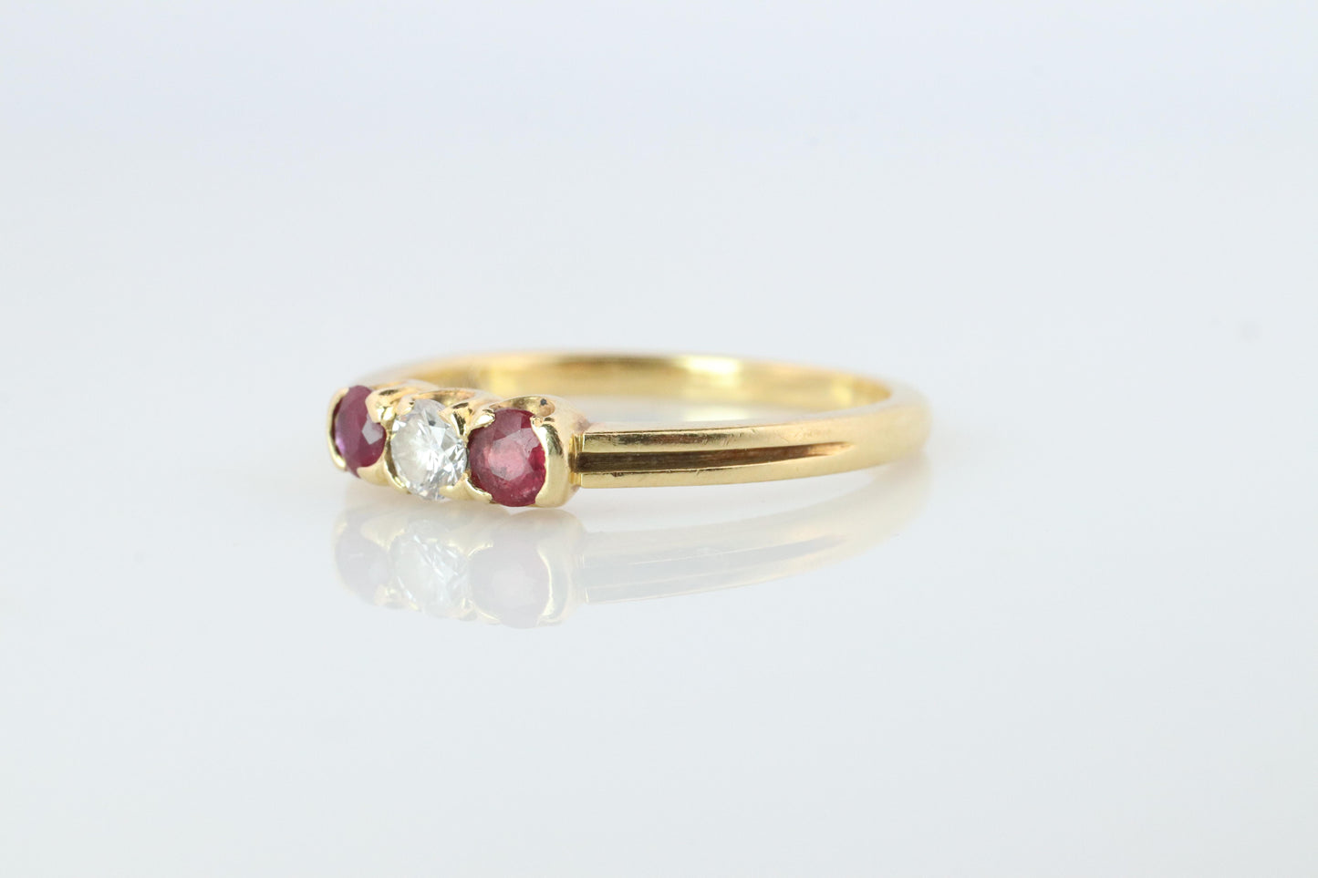 18k Tiffany and Co. Diamond Ruby Ring. 18k Gold Tiffany Ruby Trinity band