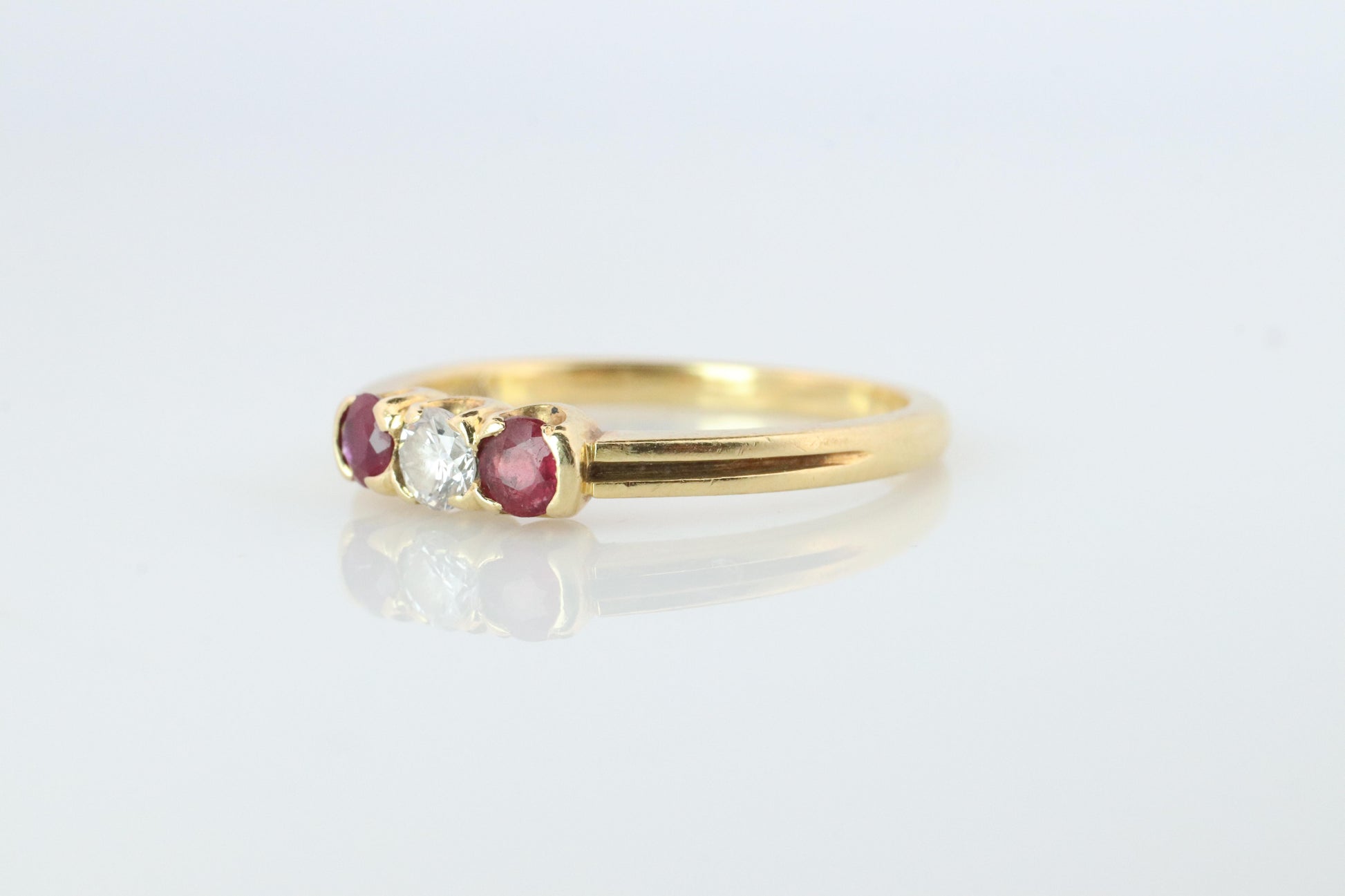 18k Tiffany and Co. Diamond Ruby Ring. 18k Gold Tiffany Ruby Trinity band
