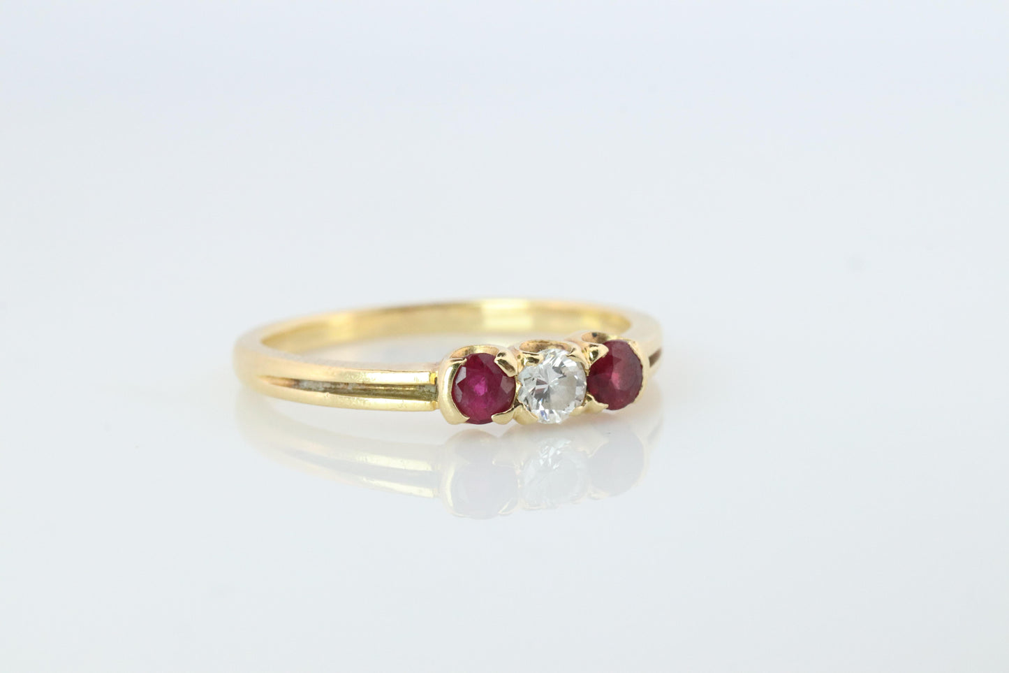 18k Tiffany and Co. Diamond Ruby Ring. 18k Gold Tiffany Ruby Trinity band