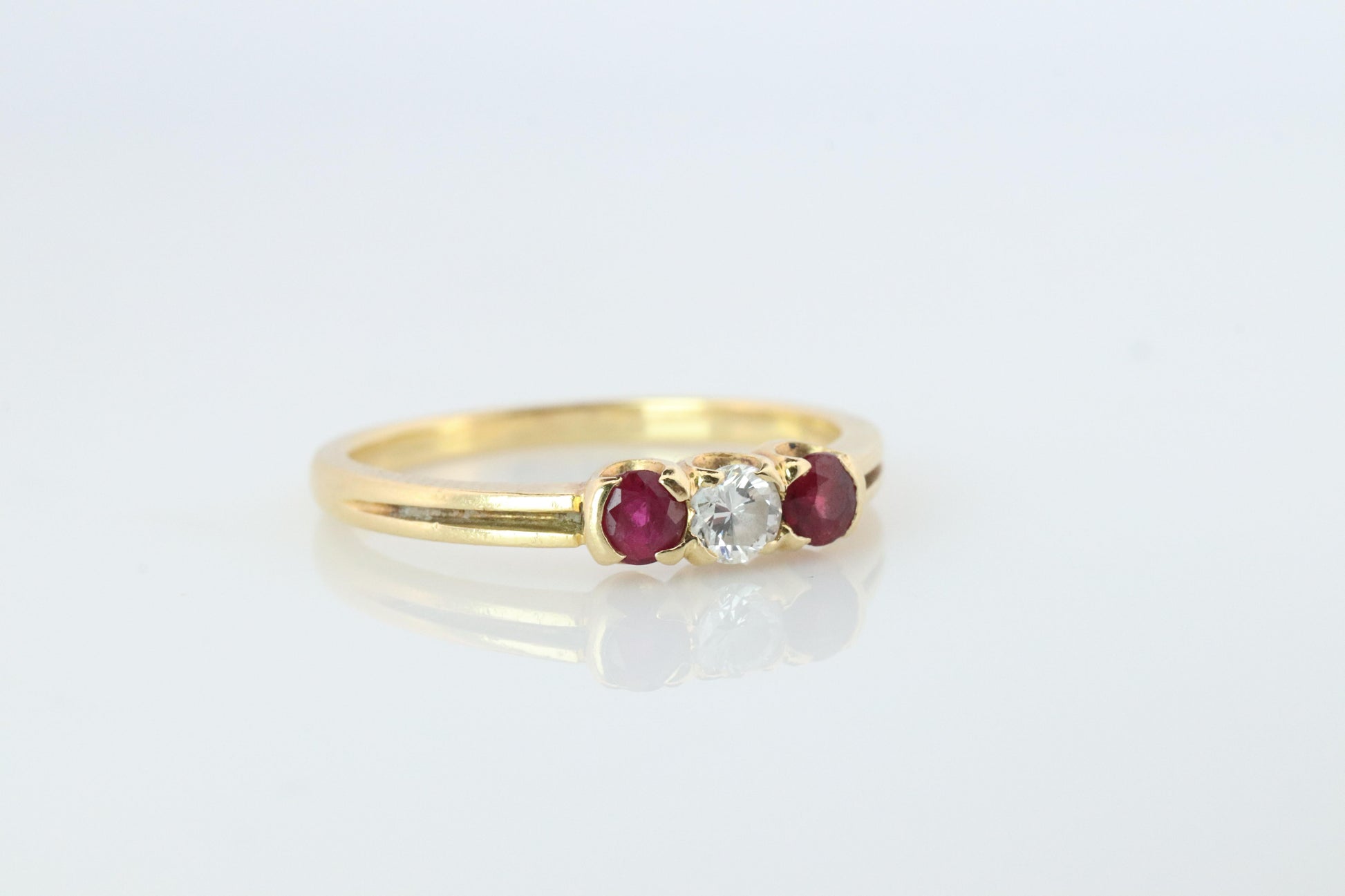 18k Tiffany and Co. Diamond Ruby Ring. 18k Gold Tiffany Ruby Trinity band