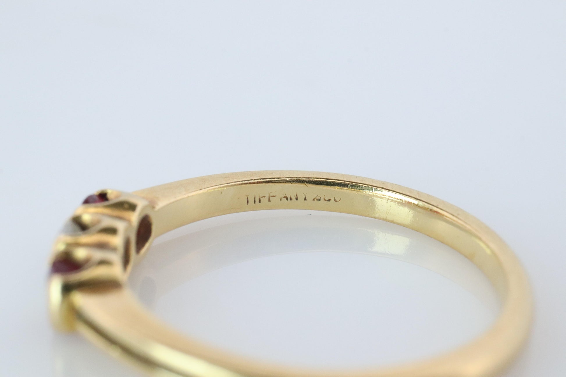 18k Tiffany and Co. Diamond Ruby Ring. 18k Gold Tiffany Ruby Trinity band