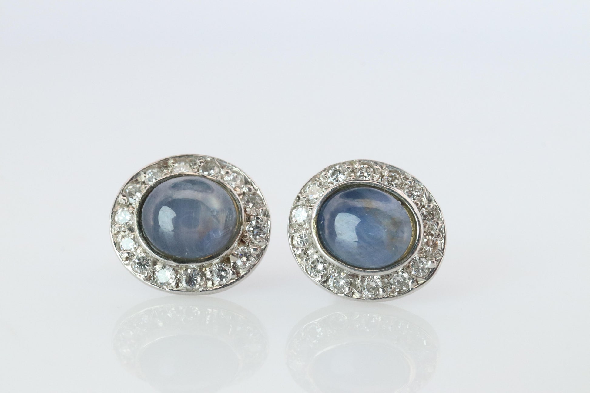 Star Sapphire Stud Earrings. Platinum PT900 Star Saphire Halo Diamond earrings.