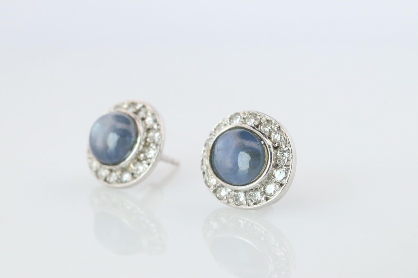 Star Sapphire Stud Earrings. Platinum PT900 Star Saphire Halo Diamond earrings.